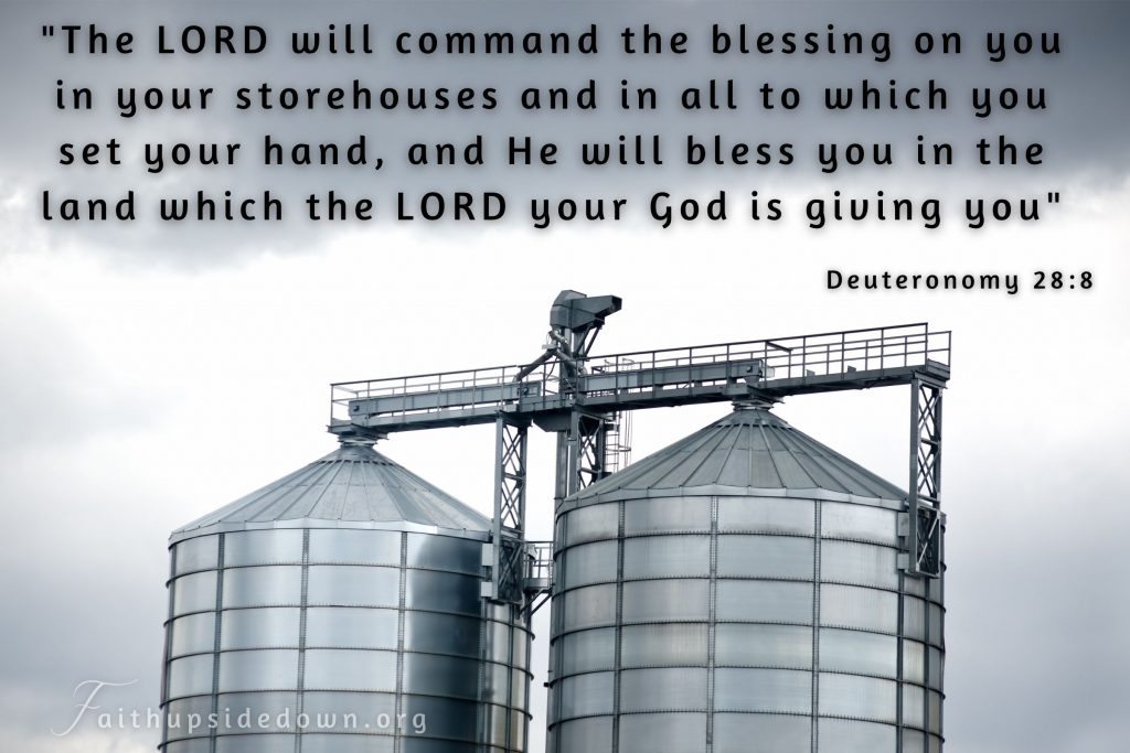 Large corn silos with Scripture verse Deuteronomy 28:8