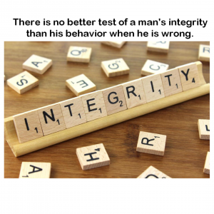 scrabble board witb the word integrity