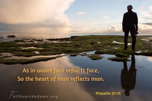 man standing near reflective lake and scripture verse Proverbs 27_19