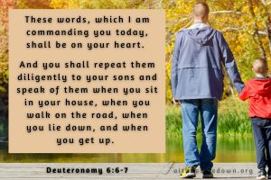 father and son walking by lake with scripture verse deuteronomy 6_6_7